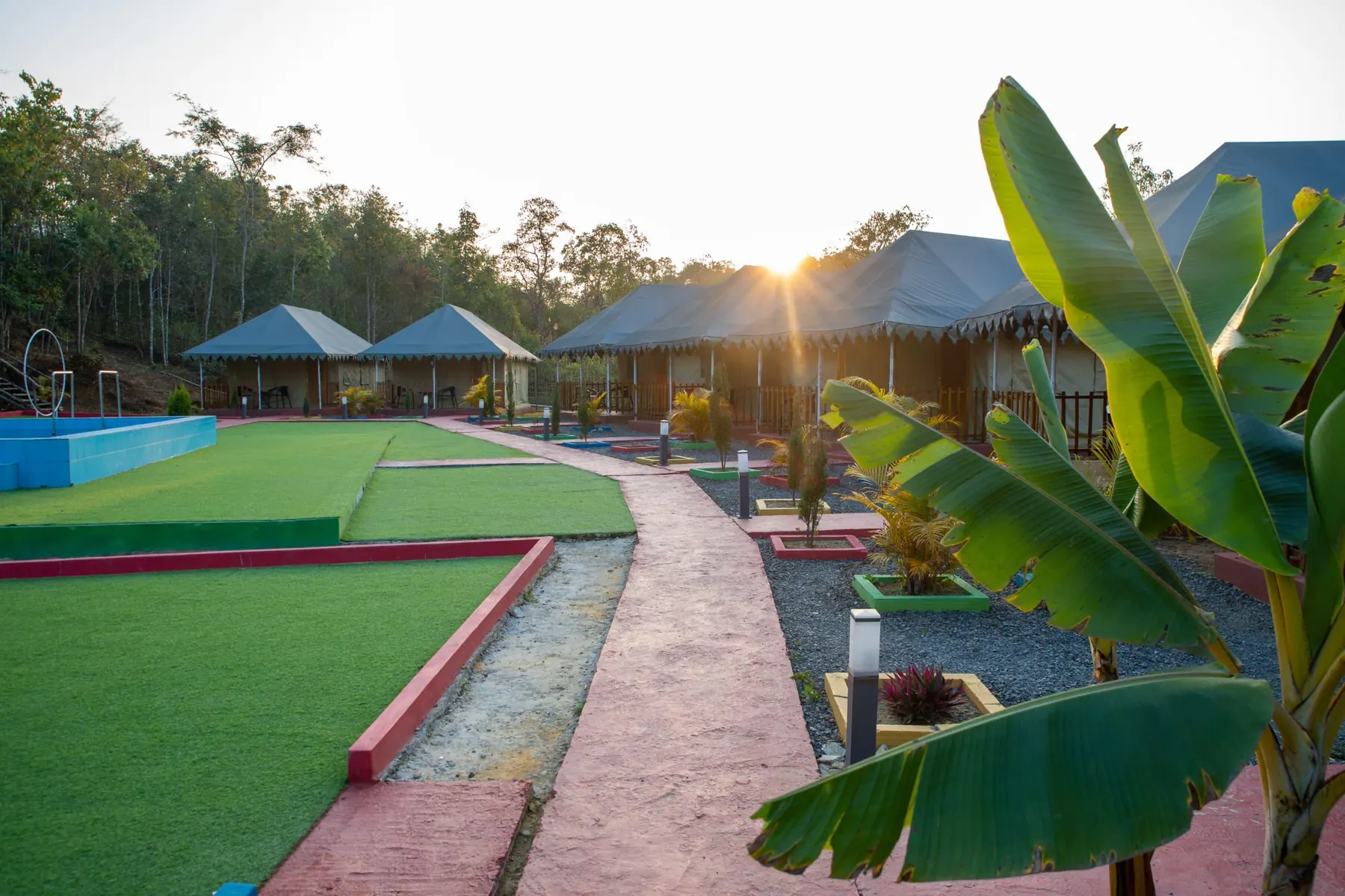 Sunset over the cottage walkway at Lalat Resort